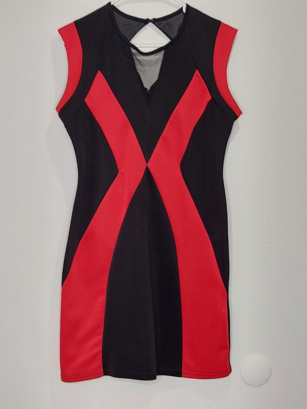 Gold Flava. Black and Red colorblock, sleeveless dress with neckline cutout👗